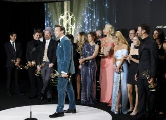 2021 Emmy Awards: “Ted Lasso” and “The Crown” Come Out on Top Jason Sudeikis and the cast and crew of "Ted Lasso" with their award for Outstanding Comedy Series at the 73rd Annual Emmy Awards.